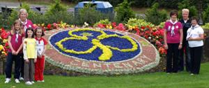 Admiring the centerary flowerbed in Broughshane.